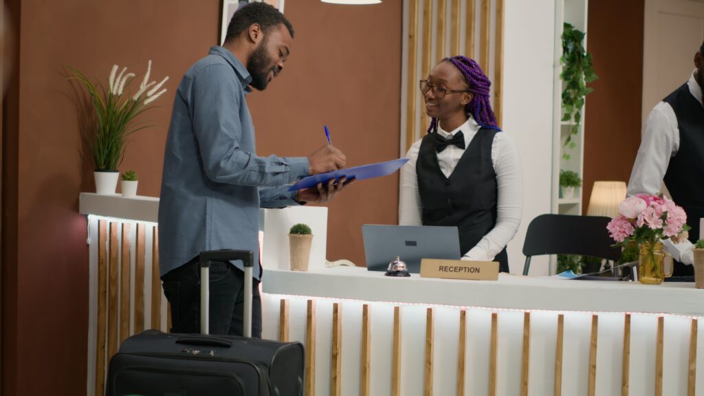 guest filling in registration forms